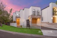 8 Ancura Court WATTLE GROVE NSW 2173 $1,490,000 - $1,590,000 Positioned privately at the end of an exclusive collection of just three brand-new residences, this architecturally designed home delivers a seamless blend of luxury, space, and functionality. Showcasing premium finishes and a thoughtfully crafted floorplan, this impressive five-bedroom home offers an exceptional lifestyle for families seeking modern comfort with high-end appeal. Designed for versatility, the home includes a bedroom and full bathroom on the ground floor-ideal for guests, in-laws, or multi-generational living. Inside, light-filled interiors and quality finishes create a warm and inviting atmosphere, while the well-planned layout ensures both everyday comfort and effortless entertaining. Features include: • Five generous bedrooms, including a luxurious master suite with walk-in robe and private ensuite • Ground-floor bedroom with adjacent full bathroom – perfect for guests or extended family • Second bedroom with oversized walk-in robe and private balcony; third bedroom also with walk-in robe; built-in robes to remaining bedrooms • Contemporary kitchen with stone benchtops, gas cooking, and a fully equipped butler's pantry • Expansive open-plan living and dining area enhanced by natural light and ceiling fans • Undercover alfresco entertaining area with built-in BBQ kitchen, flowing to a level grassed backyard with side access • Main bathroom featuring a striking skylight and separate bathtub • Ducted multi-zone air conditioning for year-round comfort • Elegant herringbone tiling downstairs and timber floorboards upstairs • Abundant internal storage throughout • Oversized single lock-up garage with internal access • Privately positioned end residence within a boutique complex of three homes A beautifully finished home offering refined living, quality craftsmanship, and exceptional attention to detail-ready to move in and enjoy.