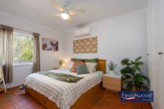 12 Herbert St Toodyay WA 6566 $669,000 Positioned at the end of a cul-de-sac on the banks of the Avon River, this home is brimming with a sense of sanctuary. From the moment you arrive, the elevated northerly aspect, the dappled light through grand eucalypts lining the riverbank, and the easy rhythm of the river signal something genuinely special. Toodyay is one of the Avon Valley’s most-loved historic towns and this property captures everything that makes it so: a connection to the landscape, a pace that restores and a welcome that lingers long after you’ve left. 3 bedrooms 1 bathroom 1991-built Hardi and iron Open plan w SC fire & AC Reno’ed kitchen fresh paint New oven, sink & lighting Main bed with BI storage North-facing front patio Colorbond shed & fencing 1534 sqm with two titles Restful riverside sanctuary The heart of the home is its central open-plan living area – a generous, light-filled space where the kitchen and family room flow naturally into one another and, through glass doors, spill out onto a north-facing patio. A peppercorn tree sways in the breeze beyond the glass, and birds chatter and cavort along the river – it’s hard to imagine a more idyllic spot for an alfresco breakfast. In the evenings, the slow-combustion fireplace draws everyone in, casting an amber glow that makes a house feel like a home. A split-system air conditioner means the seasons shift outside without ever disrupting the comfort within. The kitchen has been thoughtfully updated. Shaker-style cabinetry brings a quiet elegance, and a cleverly designed extendable island does double duty as breakfast bar and preparation space – the kind of detail you appreciate on a slow Sunday morning with coffee in hand. A new dishwasher and freestanding oven complete a kitchen that is as practical as it is considered. All three bedrooms open off the central living area, keeping the floorplan connected and intuitive. The first – just off the kitchen – is perfectly proportioned for a nursery or a quiet guest room. The main bedroom is a genuinely restful space, fitted with a full-height wall of storage that keeps clutter out of sight and its own split-system air conditioning for personalised comfort through every season. The third bedroom completes a layout that adapts as readily to a young family as it does to those seeking a weekend base or a considered downsize. A walk-through laundry connects the living areas to a well-appointed family bathroom with shower, tub and vanity, a separate WC adds everyday practicality. Outside, a large lot enclosed by new Colorbond fencing offers privacy and real possibility: room for a vegetable garden, scheme water is connected, space for children or dogs to run, or simply the pleasure of owning a generous parcel of land in town. The generous 1534 sqm block on two titles (847 sqm and 687 sqm) provides room to breathe, and the R10/50 zoning offers future flexibility. Whether you’re seeking a weekend escape a short drive from Perth, a rural lifestyle for your young family, or downsizing from a working farm while remaining in a country setting, this property offers an exceptional opportunity. The Colorbond shed, with secure rooms flanking a central open bay, adds practical storage or workshop space; the chicken coop holds the promise of freshly-laid eggs for breakfast. Toodyay’s history remains a living part of its modern identity. This home sits within walking distance of the town centre – a well-serviced country hub with supermarket, pubs, a much-loved bakery and independent shops. The town has become a popular destination for weekend breaks and day trips, with vintage car clubs among its regular visitors. During the Avon Descent, the river becomes a focal point for the community and visitors alike. The historic streetscapes, with their carefully preserved buildings and character, tell stories of the pastoral era, whilst the Avon River continues to shape the landscape and lifestyle of this enduring settlement.