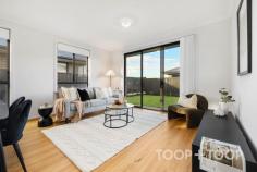 30 Merlot Rd Angle Vale SA 5117 $770,000 - $820,000 Brand New 4 bedroom family home located in Nuova Vita Angle Vale Estate…. A special opportunity to secure a brand new modern court yard residence built c.2024 on approx. 375sqm of landscaped grounds with an abundance of living and outdoor space in a superb and highly sought after location. Immaculately presented and maintained 4 bedroom home with modern style, inviting street presence and great use of space with the ability to comfortably entertain. This home will perfectly suit an array of different buyers looking to either downsize to a low maintenance, but spacious lockup and leave residence, first home buyers, investors, young families or a couple wanting nothing to do but just move in and thoroughly enjoy. The superbly appointed kitchen with modern appliances and plenty of bench, storage space and overlooks the open plan living/dining areas with relaxing views out to the landscaped grounds with low maintenance lawned rear yard, perfect for the children and pets. The master suite offers a spacious walk-in robe, luxurious en-suite with quality fixtures and fittings. There is also a versatile front 4th bedroom or second living area. The other 2 bedrooms include built-in robes and convenient access to the main bathroom with bath tub and separate toilet as well. Special features; Double garage with remote panel lift roller door and internal access. Split system reverse-cycle air-conditioning in the open plan living. Immaculate landscaped & low maintenance grounds. Many more features.... This outstanding home is beautifully located on a peaceful court within walking distance to Trinity College Gawler River, Riverbanks College, Angle Vale Primary School and Preschool, Angle Vale Soccer, Football and Netball Clubs, and close to Angle Vale Village, with an approx. 40 minute commute to the Adelaide CBD.