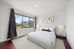 115 Namatjira Drive Fisher ACT 2611 Located in popular Fisher and close to local schools and transport, this delightful family home is a must to inspect. Originally, a privately constructed AV Jennings 1971 home, there has been extensive improvements/renovations over the years and all the hard work has been done, with the property presenting in immaculate condition. The property has also has just been re-painted. From the recently re-modelled nature strip to the back fence, the property is beautifully landscaped and maintained. This charming home features a modern kitchen with plenty of bench-space and storage, open plan living/dining room with slow combustion fireplace, three spacious bedrooms with built-in wardrobes, large linen cupboard and storage, separate laundry with external access, well-appointed renovated bathroom and separate toilet. A wonderful feature of the home is the huge deck and pergola to the rear, effectively doubling the living area. Together with the built-in bar, entertaining is a delight! Flowing down off the back of the deck you will find the firepit/BBQ zone, dropping down again to the level lawn. The property even has hidden elevated vegie patches. The entire front and back yards are delineated with professionally constructed retaining walls. Car and bike enthusiasts will be impressed by the modern and massive 4 car garage with high clearance. Offering infinite versatility, limited only by your imagination! Furthermore, the shed has cleverly been sited 3metres off the boundary, providing custom parking for a RV, caravan or boat. If required, the large driveway behind the side gate provides secure parking for numerous vehicles. There is further visitor parking for 2 established on the front nature strip Auction date: Thursday 18/06/2026 at 500pm at Ray White Manuka. Motivated vendors open to pre-auction offers. Buyer price guide $1,050,000+ Features - 915sqm rectangular block - Internal living 126sqm - Deck/pergola 52sqm - Garage 63sqm - Ducted gas heating - Gas cooking - Gas hot water - Split system R/C air con to kitchen/living - Slow combustion wood firebox in living - Solar array 4.8kw - Hard flooring to the entire home - Ceramic tiles and bamboo timber to bedrooms - Security screen to front door - Garden shed in back corner - Vegetable patches behind garage - Hills hoist in back corner - Built-in firepit and hardstand BBQ - EER: 1.5