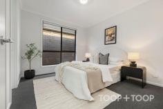 30 Merlot Rd Angle Vale SA 5117 $770,000 - $820,000 Brand New 4 bedroom family home located in Nuova Vita Angle Vale Estate…. A special opportunity to secure a brand new modern court yard residence built c.2024 on approx. 375sqm of landscaped grounds with an abundance of living and outdoor space in a superb and highly sought after location. Immaculately presented and maintained 4 bedroom home with modern style, inviting street presence and great use of space with the ability to comfortably entertain. This home will perfectly suit an array of different buyers looking to either downsize to a low maintenance, but spacious lockup and leave residence, first home buyers, investors, young families or a couple wanting nothing to do but just move in and thoroughly enjoy. The superbly appointed kitchen with modern appliances and plenty of bench, storage space and overlooks the open plan living/dining areas with relaxing views out to the landscaped grounds with low maintenance lawned rear yard, perfect for the children and pets. The master suite offers a spacious walk-in robe, luxurious en-suite with quality fixtures and fittings. There is also a versatile front 4th bedroom or second living area. The other 2 bedrooms include built-in robes and convenient access to the main bathroom with bath tub and separate toilet as well. Special features; Double garage with remote panel lift roller door and internal access. Split system reverse-cycle air-conditioning in the open plan living. Immaculate landscaped & low maintenance grounds. Many more features.... This outstanding home is beautifully located on a peaceful court within walking distance to Trinity College Gawler River, Riverbanks College, Angle Vale Primary School and Preschool, Angle Vale Soccer, Football and Netball Clubs, and close to Angle Vale Village, with an approx. 40 minute commute to the Adelaide CBD.