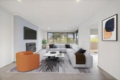 115 Namatjira Drive Fisher ACT 2611 Located in popular Fisher and close to local schools and transport, this delightful family home is a must to inspect. Originally, a privately constructed AV Jennings 1971 home, there has been extensive improvements/renovations over the years and all the hard work has been done, with the property presenting in immaculate condition. The property has also has just been re-painted. From the recently re-modelled nature strip to the back fence, the property is beautifully landscaped and maintained. This charming home features a modern kitchen with plenty of bench-space and storage, open plan living/dining room with slow combustion fireplace, three spacious bedrooms with built-in wardrobes, large linen cupboard and storage, separate laundry with external access, well-appointed renovated bathroom and separate toilet. A wonderful feature of the home is the huge deck and pergola to the rear, effectively doubling the living area. Together with the built-in bar, entertaining is a delight! Flowing down off the back of the deck you will find the firepit/BBQ zone, dropping down again to the level lawn. The property even has hidden elevated vegie patches. The entire front and back yards are delineated with professionally constructed retaining walls. Car and bike enthusiasts will be impressed by the modern and massive 4 car garage with high clearance. Offering infinite versatility, limited only by your imagination! Furthermore, the shed has cleverly been sited 3metres off the boundary, providing custom parking for a RV, caravan or boat. If required, the large driveway behind the side gate provides secure parking for numerous vehicles. There is further visitor parking for 2 established on the front nature strip Auction date: Thursday 18/06/2026 at 500pm at Ray White Manuka. Motivated vendors open to pre-auction offers. Buyer price guide $1,050,000+ Features - 915sqm rectangular block - Internal living 126sqm - Deck/pergola 52sqm - Garage 63sqm - Ducted gas heating - Gas cooking - Gas hot water - Split system R/C air con to kitchen/living - Slow combustion wood firebox in living - Solar array 4.8kw - Hard flooring to the entire home - Ceramic tiles and bamboo timber to bedrooms - Security screen to front door - Garden shed in back corner - Vegetable patches behind garage - Hills hoist in back corner - Built-in firepit and hardstand BBQ - EER: 1.5