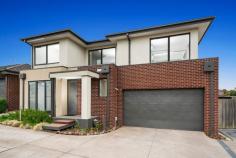 9/281 Cranbourne-Frankston Road Langwarrin VIC 3910 $599,000 - $658,000 Crafted for comfort with a finish of finesse, this contemporary 3-bedroom townhome delivers breathtaking modern refinement with real architectural presence. Perfectly positioned just moments from The Gateway and Josephine Street shops, it's the perfect choice for first-time buyers, investors, and particular downsizers, with the ideal layout for all-age enjoyment and entertaining. Soaring ceilings across both levels amplify in the open lounge and dining rooms with large windows allowing the natural light to filter through, separated with a subtle split-level design that zones the spaces perfectly for significant furniture suites and easy movement from one space to the next. The kitchen's stone-topped island and pop of bright colour anchors all with presence and practicality, highlighted with premium appliances, plenty of storage, and easy movement outdoors to its adjacent patio and yard. Accommodation begins with a ground-floor primary suite with a walk-through robe to a full ensuite with stone counters, while upstairs, two further bedrooms with robes and split-system units share a beautifully-appointed family bathroom and a second lounge. Split-system air conditioning for the main lounge, fantastic storage, a powder room and laundry, a storage shed, a rainwater tank, and a double garage with internal access add further comfort and clout. As enticing as the home itself, a prime address sits metres from buses, The Gateway Shopping Centre, Josephine Street shops, and Langwarrin Park Primary, with Elisabeth Murdoch College, Langwarrin Plaza, Karingal Hub, and freeway access all nearby.