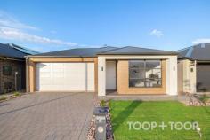 30 Merlot Rd Angle Vale SA 5117 $770,000 - $820,000 Brand New 4 bedroom family home located in Nuova Vita Angle Vale Estate…. A special opportunity to secure a brand new modern court yard residence built c.2024 on approx. 375sqm of landscaped grounds with an abundance of living and outdoor space in a superb and highly sought after location. Immaculately presented and maintained 4 bedroom home with modern style, inviting street presence and great use of space with the ability to comfortably entertain. This home will perfectly suit an array of different buyers looking to either downsize to a low maintenance, but spacious lockup and leave residence, first home buyers, investors, young families or a couple wanting nothing to do but just move in and thoroughly enjoy. The superbly appointed kitchen with modern appliances and plenty of bench, storage space and overlooks the open plan living/dining areas with relaxing views out to the landscaped grounds with low maintenance lawned rear yard, perfect for the children and pets. The master suite offers a spacious walk-in robe, luxurious en-suite with quality fixtures and fittings. There is also a versatile front 4th bedroom or second living area. The other 2 bedrooms include built-in robes and convenient access to the main bathroom with bath tub and separate toilet as well. Special features; Double garage with remote panel lift roller door and internal access. Split system reverse-cycle air-conditioning in the open plan living. Immaculate landscaped & low maintenance grounds. Many more features.... This outstanding home is beautifully located on a peaceful court within walking distance to Trinity College Gawler River, Riverbanks College, Angle Vale Primary School and Preschool, Angle Vale Soccer, Football and Netball Clubs, and close to Angle Vale Village, with an approx. 40 minute commute to the Adelaide CBD.