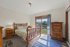 51 Paxtons Ln Mansfield VIC 3722 $950,000 - $995,000 Set on just under 10 acres on the outskirts of Mansfield, this appealing lifestyle property offers space, outlook and the kind of quiet that’s getting harder to find, all while remaining within easy reach of town. The elevated position captures lovely views across the surrounding landscape, with Mt Battery forming a picturesque backdrop. It’s a setting that feels genuinely rural, yet still connected. The four-bedroom red cedar home is comfortable and full of warmth, offering an excellent opportunity for buyers looking to undertake further improvements and realise its full potential. At its heart, the main living, dining and kitchen zone is generous in size, featuring a wood fire and split system for year-round comfort, along with new timber-look flooring that brings a fresh feel to the space. The country-style kitchen offers solid timber cabinetry and a functional layout, ready to enjoy as is or enhance to suit your vision. Accommodation is well considered, with a spacious master bedroom including a walk-in robe, ceiling fan and a large original ensuite. Three additional bedrooms all include built-in robes, while a separate study or optional fifth bedroom adds flexibility for growing families or those working from home. The bedrooms are ready for new carpet and further cosmetic improvements, providing the opportunity to personalise the home and add value over time. Outside, the property is well set up for lifestyle living, with an oversized double garage, a separate shed with concrete floor and power, a large paddock and a dam. Whether you're looking for space for animals, room to move, or simply a peaceful place to unwind, the foundations are all here for you to create something truly special. Heating & Cooling Air Conditioning Split-System Air Conditioning Split-System Heating Outdoor Features Deck Secure Parking Shed Indoor Features Built-in Wardrobes Study Eco Friendly Features Grey Water System Water Tank