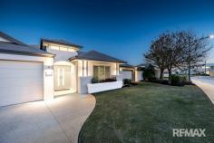 17 Daytona Dr Iluka WA 6028 $1,800,000 This genuinely intelligent coastal residence delivers the perfect fusion between location, clever design, attention to detail and the critical element of functionality. Intended as the beating heart of this stylish residence, the exquisite modern kitchen features stone bench tops and abundant cupboard/storage space. The sleek polished layout, with European inspired stainless steel appliances and chic elegant finishes, is certain to delight. Alfresco living is a notable focus of this smart and spacious home. Facilitating the sought after benefits of separation, the two independent outdoor entertaining areas are sure to impress with all-weather blinds and a relaxing water feature amongst several other key elements that will undoubtedly pique interest. Prepare to be inspired from the moment you enter this ideally positioned contemporary home situated within easy walking distance of Burns Beach Café, multiple diverse local parklands, and an endless list of essential amenities. Features • Master Suite (including walk-in-robe and En-suite) • Theatre Room – Front of House • Study (with built-in furniture) • Games room • Bedrooms 2,3,4 – Large (all with double robes) • Stone Bench Tops – Kitchen • Omega Stainless Steel Kitchen Appliances • High ceilings and recessed walls • 2 Separated Outdoor Entertaining Areas • 5kw Fronius Solar System • Quality Timber Floors & Ceramic Tiling • Ducted Reverse Cycle Air-conditioning • Fully Reticulated Gardens • Double Garage • Approx. 317m2 Living Area • Approx Block Size – 617m2