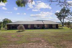 51 Paxtons Ln Mansfield VIC 3722 $950,000 - $995,000 Set on just under 10 acres on the outskirts of Mansfield, this appealing lifestyle property offers space, outlook and the kind of quiet that’s getting harder to find, all while remaining within easy reach of town. The elevated position captures lovely views across the surrounding landscape, with Mt Battery forming a picturesque backdrop. It’s a setting that feels genuinely rural, yet still connected. The four-bedroom red cedar home is comfortable and full of warmth, offering an excellent opportunity for buyers looking to undertake further improvements and realise its full potential. At its heart, the main living, dining and kitchen zone is generous in size, featuring a wood fire and split system for year-round comfort, along with new timber-look flooring that brings a fresh feel to the space. The country-style kitchen offers solid timber cabinetry and a functional layout, ready to enjoy as is or enhance to suit your vision. Accommodation is well considered, with a spacious master bedroom including a walk-in robe, ceiling fan and a large original ensuite. Three additional bedrooms all include built-in robes, while a separate study or optional fifth bedroom adds flexibility for growing families or those working from home. The bedrooms are ready for new carpet and further cosmetic improvements, providing the opportunity to personalise the home and add value over time. Outside, the property is well set up for lifestyle living, with an oversized double garage, a separate shed with concrete floor and power, a large paddock and a dam. Whether you're looking for space for animals, room to move, or simply a peaceful place to unwind, the foundations are all here for you to create something truly special. Heating & Cooling Air Conditioning Split-System Air Conditioning Split-System Heating Outdoor Features Deck Secure Parking Shed Indoor Features Built-in Wardrobes Study Eco Friendly Features Grey Water System Water Tank