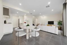 20/5 Nevertire Street Lawson ACT 2617 $599,000 Offering an outstanding combination of space, functionality and convenience, this contemporary townhouse presents an exceptional opportunity for owner-occupiers and investors alike. Thoughtfully designed across three levels, the home delivers generous living spaces, excellent separation between living and accommodation zones, and a private outdoor retreat rarely found in townhouse living. The ground floor is dedicated to everyday living, featuring a spacious open-plan lounge and dining area that flows seamlessly to the expansive private courtyard. Whether entertaining guests, enjoying a morning coffee or simply relaxing outdoors, this versatile space extends the home's living footprint and enhances its lifestyle appeal. The well-appointed kitchen is positioned at the heart of the home, offering ample bench space, excellent storage and a practical layout for daily use. Enhanced by high ceilings across both levels, double-glazed windows and ducted air conditioning throughout, the home offers year-round comfort, energy efficiency and an added sense of space and natural light. Upstairs, two generous bedrooms provide comfortable accommodation, each complete with built-in robes and their own ensuite bathroom. This highly functional configuration is ideal for professionals, small families, downsizers or those seeking flexibility for guests and shared living arrangements. Completing the package is a secure basement level with an oversized double garage and internal access, providing valuable storage and convenience. Situated in the highly sought-after suburb of Lawson, you'll enjoy easy access to the University of Canberra, Australian Institute of Sport, Belconnen Town Centre, Lake Ginninderra, local schools, cafes, parks and public transport. Combining lifestyle, location and practicality, this is a home designed to suit modern living. Internal living area - 86m² Private courtyard - 28m² Double garage - 46m² Total area - 160m² Body Corporate - Approx. $1,247 p/q Property Features Two spacious bedrooms, each with a private ensuite Built-in robes to both bedrooms Light-filled open-plan living and dining area Functional kitchen with ample bench space and storage High ceilings on both levels, enhancing space and natural light Double-glazed windows for improved comfort, energy efficiency and noise reduction Ducted air conditioning throughout for year-round climate control Large private courtyard, ideal for entertaining and outdoor relaxation Additional powder room on the ground floor, perfect for guests and day-to-day convenience Separate internal laundry Secure basement double garage with internal access Practical three-level floorplan offering excellent separation between living and accommodation zones Excellent lock-up-and-leave convenience with secure parking and storage space Low-maintenance lifestyle in a highly convenient location Close to Belconnen Town Centre, University of Canberra and Lake Ginninderra Easy access to public transport, parks and walking trails