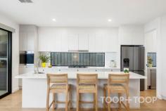 3A Cortlyne Rd Rostrevor SA 5073 Some homes impress at first glance. Others reveal their value in the way they live. Built in 2023, 3A Cortlyne Road proudly sits in both categories. A residence where intelligent design, exceptional craftsmanship and everyday practicality come together to create something increasingly rare in today's market. From the moment you step inside, there is a sense that nothing has been left to chance. Every finish, every fixture and every storage solution has been carefully selected to enhance the way the home looks, feels and performs on a daily basis. At the centre of it all, a light-filled open-plan living, dining and kitchen domain creates a natural hub for family life. Generous in scale yet warm and inviting, it is a space designed to bring people together, whether hosting a celebration with friends or enjoying a quiet evening at home. The kitchen is both beautiful and highly functional, anchored by a substantial butler's pantry and complemented by extensive cabinetry that ensures everything has its place. Every detail has been considered, delivering the storage, preparation space and functionality that modern families seek but rarely find in abundance. A separate second living area provides valuable flexibility, creating space for growing families to spread out while maintaining a strong sense of connection throughout the home. Accommodation has been equally well considered. Rarely found and highly sought after, the home offers two genuine master suites. One is conveniently positioned on the ground floor, making it ideal for guests, multi-generational living or those seeking long-term flexibility. Upstairs, the primary master retreat provides a private sanctuary complete with a walk-in robe and beautifully appointed ensuite. Two additional bedrooms, each featuring walk-in robes, continue the home's commitment to comfort, space and thoughtful design. Yet what truly distinguishes this home is something often overlooked until the day you move in. Storage. Not as an afterthought, but as a fundamental design principle. Walk-in robes to every bedroom. Extensive custom cabinetry throughout. A generous butler's pantry. Well-appointed bathrooms. A spacious laundry. Integrated storage solutions woven seamlessly into the home's design. It is the kind of practical luxury that transforms everyday living, creating a home that feels organised, uncluttered and effortlessly functional. Outside, the lifestyle continues. Designed as a true extension of the interior living spaces, the alfresco entertaining area has been created for year-round enjoyment. Complete with Ziptrak blinds and a premium brand new Matador Spark BBQ Kitchen, it offers the perfect setting for everything from relaxed family dinners to large-scale celebrations with friends. A secure double garage with internal access is complemented by additional off-street parking, while the low-maintenance allotment allows more time to enjoy everything this exceptional location has to offer. Positioned at the foot of the Adelaide Hills, Rostrevor continues to be one of Adelaide's most sought-after eastern suburbs. Renowned for its leafy streets, quality schooling options, proximity to Morialta Conservation Park and convenient access to the CBD, it offers a lifestyle that perfectly balances natural beauty with everyday convenience. What Rostrevor rarely offers, however, is a near-new home that combines this level of craftsmanship, flexibility and intelligent design. That is the opportunity that awaits at 3A Cortlyne Road. Features You'll Love + Built in 2023 + Four spacious bedrooms, all with walk-in robes + Two genuine master suites, each with ensuite and walk-in robe + Three beautifully appointed bathrooms + Two separate living areas + Expansive open-plan kitchen, dining and family living zone + Large butler's pantry + Extensive custom cabinetry and storage throughout + Premium fixtures, finishes and materials throughout + Alfresco entertaining area with Ziptrak blinds + Premium Matador Spark BBQ Kitchen + Large separate laundry + Double garage with internal access + Additional off-street parking + Low-maintenance allotment + Zoned to Stradbroke Primary and Morialta Secondary College. Close to St Ignatius College and Rostrevor College. + Prime foothills location close to Morialta Conservation Park