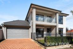 96A Reid Ave Magill SA 5072 $1,680,000 Welcome to 96A Reid Avenue, an extraordinary corner-block residence in the heart of Magill, South Australia. Bathed in natural light and defined by refined modern design, this home offers an immediate sense of calm, space, and understated elegance. Set within one of Adelaide’s most tightly held eastern suburbs, it delivers a sophisticated family lifestyle with architectural excellence, generous proportions, and effortless livability throughout. As you approach, the sleek exterior with its soft neutral tones offers a glimpse of the beauty within. Upon entering, you are greeted by a spacious lounge that flows effortlessly into an open-plan living and dining area. This space is framed by large windows, ensuring every corner is bathed in natural light. The home is thoughtfully designed with three distinct living areas, providing flexibility for everyday living, entertaining, and relaxation. The ground floor features a beautifully appointed master suite with walk-in robe and ensuite, offering privacy and comfort—ideal for guests, extended family, or multi-generational living. Upstairs continues the sense of space and functionality, featuring a second master retreat with walk-in robe, ensuite, and bathtub. Four additional upstairs bedrooms complete the accommodation, including three with built-in robes and one bedroom (adjacent to the balcony) without a built-in robe, offering flexibility as a study or additional living space. This level is further enhanced by a private balcony aspect, a well-appointed central bathroom, and an upstairs retreat with a built-in bar, including provisions for a fridge and tap—creating the perfect space for entertaining, relaxing, or hosting guests. At the heart of the home, the open-plan kitchen, living, and dining zone connects seamlessly to the outdoor entertaining area and rear yard, complete with artificial lawn and a private putting green—delivering a low-maintenance yet highly enjoyable lifestyle setting. The kitchen, a chef’s dream, boasts top-of-the-line appliances, high-end stone benchtops together with a statement stone island bench elevate the kitchen with timeless style and practicality. A standout feature of the home is the fully integrated whole-house filtered water system, providing purified water to every tap throughout the property, including bathrooms and showers. Perfectly located close to quality schools, parks, shopping precincts, cafés, and public transport, this exceptional residence presents a rare opportunity in a tightly held eastern suburbs pocket. Key features: -Constructed with rendered brick throughout, the home offers a solid build, excellent durability, and an elegant contemporary finish -Corner-block residence set on approximately 452sqm -Total living area approximately 364sqm -Ground-floor master suite with walk-in robe and ensuite -Upstairs master suite with walk-in robe, ensuite, and bathtub -Four additional upstairs bedrooms, three with built-in robes -Private balcony aspect from upstairs level -Upstairs retreat with built-in bar (fridge & tap provisions) -Three separate living areas including upstairs retreat -Gourmet kitchen with quality appliances and stone island bench -Open-plan living and dining area flowing to outdoor entertaining -Impressive 3-metre high ceilings downstairs creating a grand sense of space and natural light -Low-maintenance backyard with artificial lawn and private putting green -Fully integrated whole-house filtered water system -Security alarm system -Three-phase power for enhanced electrical capacity -13.2KW solar panel system with 27KW battery storage -Instantaneous gas hot water system -Secure double garage complete with panel lift entry and high-quality epoxy floors, alongside additional off-street parking for family and guests -Conveniently located near quality schools and local amenities -Walking distance to public transport -Easy access to The Parade, Firle Plaza, and Adelaide CBD -Close proximity to parks, cafés, and recreational facilities Whether you’re seeking a luxurious family residence in Magill or an investment opportunity with strong long-term appeal, this exceptional home is perfectly positioned to meet your needs.