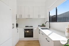 1 / 73-75 Lake Entrance Road Oak Flats NSW 2529 From the moment you arrive, this beautifully presented townhouse offers a sense of privacy and quality that is often hard to find. Positioned at the front of the complex with its own private entrance and surrounded by established gardens, it delivers the comfort and proportions of a home while retaining the ease of low maintenance living. Step inside and you will immediately appreciate the generous scale of the interiors. High ceilings enhance the feeling of space, while the thoughtfully designed floorplan provides completely separate living and dining zones, allowing room for both everyday living and entertaining. The kitchen is a standout feature, combining timeless style with modern practicality. Stone benchtops, an integrated dishwasher, plumbed fridge space and extensive storage create a space that is equally suited to busy family life or hosting guests. Large stacker doors draw the outdoors in, opening to a covered alfresco area where weekend barbeques, morning coffees and relaxed evenings can be enjoyed against a backdrop of picturesque gardens. The seamless connection between the indoor and outdoor spaces gives the home an inviting, open feel throughout the seasons. Ducted air conditioning throughout, upstairs has 3 generous bedrooms including a spacious master suite complete with ensuite. The main bathroom offers a touch of luxury with a freestanding bath, while the inclusion of 3 toilets adds everyday convenience. Located just moments from Oak Flats shopping precinct, Shellharbour City Centre, the bowling club, schools, cafés, public transport and the waterfront lifestyle of Lake Illawarra, this is a home that combines modern comfort with exceptional convenience. HIGHLIGHTS • Near new townhouse with house like proportions • Privately positioned at the front of the complex with its own entrance • High ceilings and ducted air-conditioning • Stylish kitchen with stone benchtops and quality inclusions • Separate living and dining areas • Seamless indoor-outdoor flow via stacker doors • Covered alfresco overlooking beautifully landscaped gardens • Master bedroom with ensuite • Freestanding bath to the main bathroom • 3 toilets and excellent storage throughout • Double garage with internal access • Convenient location close to shops, cafes, transport, bowling club and Lake Illawarra Offering the perfect balance of style, privacy and practicality, this is the kind of home that allows you to spend less time maintaining and more time enjoying everything the Oak Flats lifestyle has to offer.