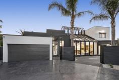 7 Harsburg Ct Taylors Lakes VIC 3038 $1,680,000 - $1,800,000 Architectural Masterpiece with Resort-Style Entertaining & Unrivalled Luxury A statement of contemporary excellence, this extraordinary residence has undergone a complete transformation, delivering a level of luxury, craftsmanship and technology rarely seen in today's market. Occupying an impressive 764sqm (approx.) allotment, every element of this remarkable home has been meticulously curated to create a lifestyle of sophistication, comfort and effortless entertaining. Behind the automated gates, the home immediately captivates with soaring ceilings, dramatic architectural voids and a stunning central atrium crowned by an automated 6.2-metre sunroof. Rich Euro Oak engineered flooring flows throughout, while a striking Tassie Oak floating staircase with frameless glass balustrading creates a breathtaking focal point and sets the tone for the quality that lies ahead. Designed to accommodate growing families without compromising on luxury, the expansive floorplan offers four generous bedrooms, including two master suites complete with walk-in robes and beautifully appointed ensuites featuring LED Wi-Fi mirrors, heated towel rails and premium stone finishes. A custom-designed study with twin workstations, extensive cabinetry and commercial-grade glass sliding doors provides the ideal work-from-home environment, while an attic retreat offers additional storage and versatility. At the heart of the home lies a stunning designer kitchen that will impress even the most discerning entertainer. Showcasing expansive stone benchtops, a substantial island, butler's pantry and bespoke cabinetry, the space is complemented by an exceptional suite of premium appliances including twin NEFF ovens with steam and air-fry functionality, a five-zone NEFF induction cooktop, Asko dishwasher, Sirius twin-motor rangehood and premium Franke and Blanco fixtures. A custom-built glass display pantry further enhances the dining domain, creating a seamless blend of functionality and style. The adjoining living and dining zones are bathed in natural light and enhanced by designer lighting, a slimline gas fireplace and soaring architectural proportions, creating a welcoming atmosphere for both everyday family living and large-scale entertaining. For wine enthusiasts, a fully fitted wine room with feature glass display, custom wine racking and an included wine collection offers a truly unique entertaining experience. Stepping outdoors reveals a private resort unlike anything else in the area. The expansive undercover alfresco is equipped with automated outdoor shutters, ZipTrack blinds and premium German-engineered SOMFY automation, allowing year-round entertaining at the touch of a button. Overlooking the entertaining area is a stunning fully electric heated swimming pool complete with robotic cleaning system and automatic chemical dosing, creating the ultimate low-maintenance luxury lifestyle. Adding another layer of appeal is a professionally finished basketball court, secure accommodation for up to nine vehicles and a comprehensive suite of smart-home features. From full-colour night vision CCTV with intrusion detection, automatic sensor lighting and electric aluminium shutters throughout, to fibre-to-the-home NBN connectivity, new electrical and plumbing infrastructure, and six individual Mitsubishi inverter systems providing zoned climate control, every detail has been carefully considered to deliver unrivalled comfort, convenience and peace of mind. A residence of this calibre is exceptionally rare and virtually impossible to replicate at today's building costs. Combining architectural brilliance, resort-style entertaining and an extensive list of premium upgrades, this is a landmark family home that offers a lifestyle beyond comparison. A truly one-of-a-kind opportunity where luxury, technology and design come together in perfect harmony. *Inspections By Appointment Only or Advertised Times* Contact our Team to arrange your private inspection