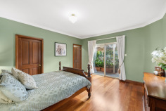 6 Sovereign Ct Mount Barker SA 5251 $1,600,000 - $1,700,000 Waterford Sanctuary: Federation Charm, Workshop Shed, and 1.13 Acres of Pure Lifestyle There are properties that offer a house on a block, and then there are properties that offer a whole way of life. This 2003 McCracken Homes Federation-style build on 1.13 acres in the sought-after Waterford precinct is firmly in the second category. From the drive-through motorhome access and three-phase workshop shed to the established orchard and 45,000-litre rainwater system plumbed through the home, every corner of this cul-de-sac holding has been developed with intention, and it shows. Inside, nine-foot ceilings and quality solid timber internal doors set a tone that carries from the formal living room through to the rear of the home. The formal living space features timber flooring and a Nectre slow-combustion wood heater, while the separate formal dining room anchors itself with a bay window overlooking the gardens. The kitchen is a proper working hub, with an island bench, walk-in pantry, and a new Bosch dishwasher, opening through to the meals and family living area where a second Nectre wood heater and split-system air conditioning make year-round comfort effortless. Ducted evaporative cooling runs throughout the whole house, and new LED fittings have replaced every halogen across the property. The raised timber deck and large pitched-roof pergola entertaining area is where the Adelaide Hills seasons really come alive. Morning coffee with orchard views across cherry, Fuji apple, Gala apple, nectarine, mulberry, lime, passionfruit, plum, lemon, orange, mandarin, almond, and more; summer evenings under the pergola with the garden doing the heavy lifting. Raised vegetable beds on mains water, automatic mains-fed drip irrigation to the garden, pine bark mulched bush-walk paths, and a garden shed with shelving round out a rear garden that is genuinely established and entirely usable. The master bedroom is generously proportioned with a walk-in robe and ensuite, while one further bedroom features a built-in robe. The fourth bedroom, currently a study but noted by agents as another big bedroom, adds real flexibility. The main bathroom delivers a twin vanity, spa bath, and separate shower, and new toilets have been fitted across both bathrooms. The shed is the headline act for anyone who works with their hands, runs a trades business, or needs serious vehicle storage. Three-phase power, a concrete floor, a vehicle inspection pit, an overhead crane with trolley and chain hoist, eight-tube LED lighting, security cameras, internet connectivity, and a mezzanine level with properly engineered structural flooring make this a workshop that means business. A manual 500kg chain hoist is also included. Drive-through access from the double garage accommodates a 7.9-metre motorhome or 20-foot caravan with ease, a rare find at this price point in the Hills. What you'll love: • Entertainer's Edge: Raised timber deck and large pitched-roof pergola entertaining area with established orchard views across fifteen-plus fruit and nut varieties. • Workshop Benchmark: Three-phase shed with concrete floor, inspection pit, overhead crane with trolley and chain hoist, mezzanine level, LED lighting, and drive-through caravan or motorhome access. • Water Independence: 45,000 litres of rainwater storage plumbed to the full house, including a dedicated 22,500 litres for rear garden irrigation. • Energy Efficiency: 9kW solar system split across house and shed roofs with internet-connected monitoring, solar hot water, plus dual Nectre slow-combustion heaters and ducted evaporative cooling. • Custom Character: Solid timber internal doors throughout and nine-foot ceilings across the whole home. • Connected Infrastructure: NBN fibre to the premises with data points, a patch panel, and structured cabling throughout. • Lifestyle Location: 1.13-acre cul-de-sac position in the Waterford precinct with established landscaping, bush-walk paths, and room to breathe. For the buyer who wants genuine land, a serious workshop, a productive garden, and a Federation-character home that has been upgraded thoughtfully over two decades, this Waterford holding is a rare and complete package. All information provided has been obtained from sources we believe to be accurate, however, we cannot guarantee the information is accurate and we accept no liability for any errors or omissions.