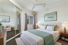 5 Margaret St Stuart Park NT 0820 Offers Over $600,000 Considered Positioned just moments from the CBD, this executive-level townhouse delivers low-maintenance city living with smart design, ample storage and inviting indoor–outdoor spaces. Secure within a well-maintained complex, the home offers dual carport parking for two vehicles and a private rear courtyard, freshly mulched and framed by palms and tropical plants. A mounted clothesline adds everyday practicality to this leafy outdoor zone. Inside, the light-filled ground floor features tiled, open-plan living and dining areas cooled by louvered windows that capture breezes. The well-appointed kitchen includes wraparound benches, a dishwasher, overhead cupboards and plenty of workspace, while generous storage under the stairs is perfect for seasonal items and decorations. A separate laundry with additional cabinetry doubles as an ideal mud room, and a handy ground level powder room enhances convenience for residents and guests alike. A feature window on the staircase casts coloured light as you move to the upper level, where the accommodation is privately positioned. The master suite includes a walk-in robe, modern ensuite with glass-framed shower and built-in vanity storage, plus direct access to a balcony overlooking the rear of the complex. The second bedroom is fitted with a built-in robe and soft carpet underfoot, serviced by the main bathroom with a relaxing bath–shower combination. Vacant and ready to occupy or lease out immediately, this well-located townhouse presents an outstanding opportunity for professionals, investors or downsizers seeking contemporary comfort just minutes from the city lights. • Executive level townhouse only moments from the CBD • Carport parking bay secure within the complex setting for two • Courtyard has been freshly mulched with palm trees and tropical plants • Mounted clothes line in the courtyard for added function • Ground level light filled living areas with tiled flooring and louvered windows • Kitchen has wrap around counters, dishwasher and overhead storage space • Storage galore under the stairs – great for the decorations • Laundry room has additional storage space / a great mud room option • Stairs lead through to the first floor above with decorative window throwing coloured light • Master bedroom suite includes a walk in robe and ensuite bathroom • Balcony access from the master bedroom – overlooks the front of the complex • Additional bedroom with a built in robe and carpeted flooring • Main bathroom has a relaxing bath tub and shower combo • Ensuite bathroom has a glass framed shower and vanity with storage built in • Ground level powder room for added convenience • Vacant and move in or rent out ready home in a great location only moments from the city light Around the Suburb: • Walk to the city in under 10 minutes • Say yes to those last minute coffee dates and mid week meals • Nearby to Cullen Bay and the Marina • George Brown Botanical Gardens and the Casino only moments away • Head down to the Water Front for a swim or a quick meal Council Rates: Approx. $1,890.00 per annum Area Under Title: 202 square metres Year Built: 2000 Zoning: LMR (Low-Medium Density Residential) Status: Vacant Possession Rental Estimate: $650 a week Body Corporate: Castle Real Estate Body Corporate Levies: Admin: $1,485.00 PQ Sinking: $270.00 PQ Approx. $1,755.00 per quarter Settlement: 30 days or by negotiation Deposit: 10% or variation on request Contact Stuart Rodda on 0424780982
