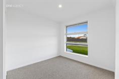 4 Maney Court Latrobe TAS 7307 770,000 Why wait to build when all the hard work has already been done? Completed to an exceptional standard and ready for it's new owners to enjoy, this brand-new home offers modern style, quality finishes, and thoughtful inclusions rarely found in a new build. Positioned in one of the area's newest subdivisions, this home has been designed for effortless living. Whether you're purchasing your first home, downsizing without compromise, or adding a quality property to your investment portfolio, this home is ready to impress from the moment you arrive. At the heart of the home, the light-filled open-plan living and dining space centres around a beautifully appointed kitchen featuring stone benchtops, quality Haier appliances including a refrigerator, a generous island bench, and a walk-in pantry. Stacking sliding doors extend the living space onto the sun-filled concrete alfresco, creating the perfect setting for entertaining or simply enjoying the afternoon sunshine. The accommodation comprises three bedrooms and two beautifully finished bathrooms, each showcasing floor-to-ceiling tiling, stylish black fittings and fixtures, and a timeless, contemporary colour palette. Soft loop pile carpet adds warmth and comfort to the bedrooms, while the quality finishes throughout create a home that feels both modern and inviting. Practicality has been carefully considered, with a separate laundry complete with a Haier washing machine and heat pump dryer, two linen cupboards providing exceptional hallway storage, and a double garage with internal access. Outside, the fully fenced backyard offers plenty of room for children, pets, or future landscaping projects, with the added convenience of backyard vehicle access and pre-approval already in place for a 6m x 6m shed. Located in the ever-popular township of Latrobe, you'll enjoy both modern living and everyday convenience. Just minutes from local cafés, shopping, schools, medical facilities and the Mersey Community Hospital, Latrobe is renowned for its welcoming community, picturesque streetscapes and relaxed lifestyle, while Devonport's CBD, airport and Spirit of Tasmania terminal are all within an easy drive. With quality inclusions, craftsmanship, and absolutely nothing left to do but unpack, this is an outstanding opportunity to secure a brand-new home without the delays and uncertainty of building. For more information or to arrange your inspection, contact listing agent Emily Carmichael today. One Agency Collins Real Estate has systems and procedures in place to verify the accuracy of the information provided. However, purchasers should make their own enquiries and rely on their own investigations.