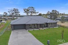31 Glenmore Drive Tamworth NSW 2340 $1,200,000 - $1,250,000 This well-designed family home is the epitome of luxury living and the perfect place to call home. Set up for entertaining with sensational indoor and outdoor living areas and a sleek modern kitchen at the heart of the home boasting a butler's pantry and huge island bench. Expansive open plan living and dining, an additional media room, plus an office and ample storage space throughout. Offering four bedrooms, each complete with built in wardrobes with the master suite encompassing class and elegance with a walk-in robe and spacious and sophisticated ensuite. The sparkling swimming pool is a true staple of this home, with incredible views creating a relaxing space to unwind. Other features include ducted reverse cycle air-conditioning throughout and a double lock up garage. Located in the popular estate of Moore Creek Gardens on approximately 2,033sqm of land, this incredible package is not to be missed. Crafted for the modern family, every inch of this home has been thoughtfully curated. From its sophisticated layout to its stylish features, this residence is an oasis where families can live, entertain, and unwind in pure comfort.