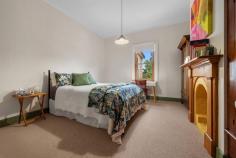 112 David St East Devonport TAS 7310 $845,000 Timeless Circa 1888 Character Home on 1,234 m2 – A Rare East Devonport Gem Step back in time while enjoying modern comfort at 112 David Street, East Devonport. A beautifully preserved circa 1888 residence set on an expansive 1,234 m2 block. This charming four bedroom home blends historic elegance with thoughtful updates, offering space, warmth and lifestyle in equal measures. The home retains its classic character while offering the comfort and presentation today’s buyers seek. Garden & Lifestyle: A full-length picket fence offers additional privacy as well as being child and pet safe, a double carport adjoins a private deck area for early morning coffee or just to contemplate the day ahead. This property offers not just a home, but a lifestyle – space to grow your own produce, enjoy nature and relax in complete privacy. The lounge / living is of two components, features classic high ceiling lined in Tasmanian Oak. Quality block out drapes, as new carpet and painted with a neutral colour platelet throughout the home. The second living / lounge offers a more contemporary setting with lower ceiling, down lights and expansive windows leading to the huge deck area that overlooks the garden. The light and airy timber kitchen has gas cooking, as well as huge meal preparation areas, Ariston dishwasher plus ample room for a double refrigerator. The large adjoining dining area features ornate fireplace with desk alcove and multiple shelving for those special ornaments. There are two heat sources within the home, the hallway has a Mitsubishi reverse cycle air conditioner, the dining and lounge rooms have online gas. Sixteen solar panels and 3.7 kw inverter assist in reducing electrical consumption. The bedrooms are wide, spacious, spectacular polished floors, high ceilings as well as built ins in most rooms. Fireplaces are ornamental but could be reinstated should you choose. Bathroom/ Laundry, Powder room: All have been rebuilt over the last few years, tastefully furbished with classic features and authentic timber windows Homes of this era, on land of this size, are increasingly rare. Set on a massive 1,234 m2 parcel, the garden is a private sanctuary featuring an extraordinary variety of established trees and plants including Pear, Cherry, Walnut, Olive, Double grafted Apple, Lemon, Plum, Peach, Grape vines, Mulberry, Kumquats, Kiwi fruit, Tahitian lime, Ginko Biloba and Feijoa. A well – established greenhouse provides year – round greens and fresh herbs including Rosemary, Sage, Oregano and Fennel – perfect for the home cook or garden enthusiast, additional outdoor features include – Bird aviary, numerous storage sheds, private bee hives producing exceptionally sweet honey. Beautiful black parrots can be seen amongst the trees at certain times, their glossy feathers shimmering against a backdrop of lush green foliage. A garden of discovery, where natures elegance takes flight, with every visit brings you closer to nature. If you’ve been searching for character, charm and a remarkable garden setting, this is an opportunity not to be missed. Enquire today to experience this unique East Devonport treasure. Sushames Real Estate trusts in the information in this document which has been sourced from means which are considered reliable. Prospective purchasers are recommended to carry out their own due diligence regarding permits, measurements and boundary positions prior to settlement.