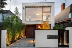 61 Andrew St Windsor VIC 3181 $2,250,000 - $2,475,000 Expressions of Interest closing Tuesday 11th August at 2pm Architecturally designed by Harding Architects, this freestanding contemporary residence delivers exceptional proportions, beautiful northern light and effortless indoor-outdoor living in one of Windsor's most coveted streets. Striking industrial influences, soaring expanses of glass and thoughtfully curated finishes combine to create a home that is both sophisticated and wonderfully liveable. The expansive open plan living and dining domain is the undeniable centrepiece, framed by a striking exposed brick feature wall and flowing seamlessly to a private north-facing limestone paved entertaining terrace. Professionally landscape design by acclaimed landscape architect Lisa Ellis, the fully irrigated gardens provide a tranquil backdrop to a plunge pool, while a burnished concrete outdoor kitchen with integrated cabinetry and an Italian-made Artusi barbecue creates an exceptional setting for entertaining. At the heart of the home, a beautifully appointed kitchen overlooks the living spaces, balancing generous functionality with understated contemporary style. The luxurious main bedroom enjoys leafy street outlooks through floor-to-ceiling glazing, complemented by a walk-in robe and sleek ensuite. Three further oversized bedrooms, a dedicated study and a stylish central bathroom with an inbuilt bath and separate rain shower provide outstanding flexibility for families of all stages. A significant enhancement to the property is the addition of secure off-street parking, accessed via an automated sliding gate, while premium landscape lighting, quality Filetti paving and beautifully considered gardens complete the home's exceptional outdoor spaces. Positioned in one of Windsor's widest and most tightly held streets, this outstanding home is moments from High Street, Prahran Market, Windsor Siding, Windsor and Prahran stations, and leading schools including St Michael's Grammar and Wesley College. Inspections Saturday, 18 July 10:45am - 11:15am