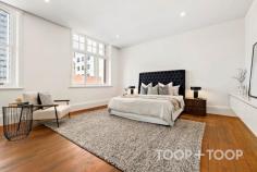 Ste 4/23 Peel St Adelaide SA 5000 $990,000 - $1,089,000 NEW YORK LOFT STYLE APARTMENT WITH UNBEATABLE INNER-CITY LOCATION PLEASE CALL FOR PRIVATE INSPECTION Cleverly restored in 2016, the redevelopment was envisioned to provide entire spaces with the flexibility to suit premium residential living. Offering rare versatility and a striking New York loft-style feel, this unique city-fringe space presents an exciting opportunity to create a one-of-a-kind residence. Set high on the 4th floor, the property enjoys a sense of seclusion while still being immersed in Adelaide’s thriving West End district, with sweeping north, west and easterly views across the city skyline. Home to some of the city’s best hospitality venues, and within walking distance of Rundle Mall and Adelaide Railway Station, the location is second to none. Inside, soaring ceilings, vast open spaces and abundant natural light create a true blank canvas. A fully equipped kitchen delivers premium functionality, with integrated NEFF induction cooktop, oven and microwave, a SMEG dishwasher, stainless steel splashback, Siema sink and a fully integrated Liebherr fridge/freezer. A concealed bathroom with shower and European laundry sits discreetly behind the kitchen, while block-out blinds, sheer curtains and quality finishes throughout enhance everyday comfort. The building offers intercom, lift and stair access, with a vestibule providing added security upon property entry. With its flexible floorplan and unbeatable location, 4/23-25 Peel Street presents a unique opportunity to secure a truly distinctive city residence within one of Adelaide’s most vibrant lifestyle precincts. FEATURES WE LOVE • Flexible floorplan • North, west and easterly city views • Open-plan layout + separate bedroom with wall-to-wall BIR • Secure building, high ceilings, quality fit-out, Tallowwood floors • Contemporary kitchen with NEFF appliances, SMEG dishwasher, Liebherr fridge/freezer • Concealed bathroom with linen storage + potential for European laundry • Sheer + block-out blinds • Balcony • Lift & stair access + intercom system LOCATION • Prime inner-city location, walk to Rundle Mall, Adelaide Oval & Adelaide Railway Station • Nearby dining at leading restaurants including favourites including Fugazzi, Leigh Street Wine Room, Peel Street Restaurant & Meat & Wine Co • Excellent public transport options with bus, tram & train all within short walking distance • Just 7km to Adelaide Airport PARKING • Multiple nearby parking facilities available with flexible subscription options