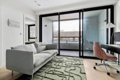 114/44 Gillies St Fairfield VIC 3078 EOI $400,000 - $440,000 Expressions of Interest Closing Wednesday 12 August at 5pm Contemporary unit, walk to station & cafes Brilliantly positioned in the acclaimed 'Greenwich' complex, this sophisticated one-bedroom apartment delivers the ultimate in vibrant inner-city living. Securely tucked away yet offering immediate doorstep access to Fairfield Station, an on-site ground-floor café, and a lush communal garden, the location is simply unmatched. Inside, contemporary timber-look flooring anchors a superb open-plan meals and living zone. Seamlessly flowing out to a private balcony, it offers the perfect layout for morning coffees or effortless evening relaxation. The masterfully designed entertainer’s kitchen serves as the home's striking hub. It showcases premium stone benchtops, a versatile island bench, a dual-tone palette of crisp white and warm timber cabinetry, a gas cooktop, a dishwasher, and a sleek integrated fridge. Rest and relaxation are assured in the generous bedroom, complete with a massive built-in robe. It is well-serviced by a huge, fully-tiled bathroom boasting premium floor-to-ceiling tiling and a large shower. Further highlights include a clever European laundry, split-system heating/cooling, a dedicated undercover car space, a handy storage cage, a bike shed, and ample guest parking. Embrace a life of total convenience. You are just steps away from the iconic Station Street Shopping Village, bustling cafes, gourmet grocers, and the scenic Yarra River walking trails. It is an exceptional opportunity for first-home buyers, professionals, and savvy investors alike.