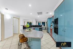 6 Reeve Cl Amaroo ACT 2914 $1,249,000+ Next inspection: Saturday, 18 Jul 12:15pm - 1:00pm City Benefits, Countryside Living – A Rare Amaroo Masterpiece Offering Spectacular Views, Family Space & an Unforgettable Lifestyle There are homes that tick boxes, and then there are homes that create a feeling. The moment you arrive at 6 Reeve Close, Amaroo, you’ll understand why properties like this are so rarely offered to the market. Positioned in one of Amaroo’s most tightly held cul-de-sacs, this remarkable residence captures breathtaking uninterrupted views across Ginninderra Creek, open parklands and the rolling hills beyond. Wake each morning to sweeping vistas that make it feel as though you’re living on a private country estate, yet enjoy the convenience of schools, shops, transport and Gungahlin Town Centre only moments away. It is the perfect balance of tranquillity and accessibility. Imagine enjoying your morning coffee while the sun rises across the valley. Picture children playing safely in the quiet cul-de-sac, riding bikes, kicking a football in the expansive reserve opposite, or exploring the endless green spaces that become an extension of your own front yard. This is more than a home. It is a lifestyle. Step inside and discover a residence designed for families who value space, flexibility and comfort. Freshly updated and beautifully presented, the home offers an abundance of living zones that allow every family member to enjoy their own space while remaining connected. The heart of the home is centred around generous family living areas, flowing seamlessly between the kitchen, dining and living spaces. Whether hosting large family gatherings, entertaining friends, enjoying movie nights, or simply relaxing after a long day, every space has been thoughtfully designed to accommodate modern family life. Offering four spacious bedrooms, multiple living areas, a dedicated rumpus room, a separate gym, and an impressive detached teenage retreat, this home effortlessly adapts to changing family needs. The retreat presents endless possibilities as a studio, home office, creative workspace, guest accommodation or private sanctuary for teenagers seeking independence. Comfort is assured throughout every season with ducted reverse-cycle air conditioning, in-slab heating and an impressive suite of energy-efficient upgrades rarely seen in residential homes. The substantial solar system, battery storage and Tesla charger create a future-focused residence designed to significantly reduce energy costs while enhancing sustainability. Outside, beautifully landscaped gardens, mature fruit trees and multiple entertaining spaces provide the perfect backdrop for weekend barbecues, celebrations and family gatherings. Every corner of the property has been designed to maximise enjoyment of the extraordinary setting. Quite simply, homes like this don’t come along often. A home where children can grow, families can gather, and memories can be created for years to come. A home that offers incredible space without sacrificing convenience. A home where the outlook is as spectacular as the lifestyle. Welcome to one of Amaroo’s most exceptional opportunities. Property Features Accommodation & Living Four bedrooms Master bedroom with a walk-in robe and private ensuite Bedrooms 2 and 3 with built-in robes Main bathroom servicing the family bedrooms Separate WC Formal living room Spacious family room Separate dining area Large rumpus room Dedicated gym/multipurpose room Detached teenage retreat/studio* Functional kitchen positioned at the heart of the home Large laundry with external access Double lock-up garage with internal access Kitchen Features Electric cooktop Electric oven Premium Miele dishwasher Ample bench space Breakfast bar Excellent storage throughout Comfort & Energy Efficiency 20.8kW solar system 65kW Fox battery storage system Tesla wall charger Ducted air conditioning Floor heating for year-round comfort Water purification system providing filtered drinking water Combination of single and double-glazed windows Concrete roof tiles Brick veneer construction on concrete slab Additional Improvements Approx. 35sqm gym extension* Approx. 25sqm front patio extension* Approx. 25sqm teenage retreat/multipurpose space* New roof tiles and roof restoration completed Rear timber decking installed within the last 12 months Professionally landscaped gardens Full mulch and decorative pebble landscaping *Buyers should make their own enquiries regarding approvals, permits and measurements.* Outdoor Lifestyle Covered outdoor entertaining areas Established landscaped gardens Fruit trees, including cherry, plum, and lemon varieties Private outdoor spaces for relaxation and entertaining Quiet cul-de-sac setting Large corner block position Prime Amaroo Location Located within one of Gungahlin’s most established and family-friendly suburbs, the home enjoys convenient access to schools, shopping centres, recreational facilities and public transport. Nearby amenities include: Amaroo School (P–10) Good Shepherd Primary School Amaroo Village Shopping Centre Gungahlin Marketplace Gungahlin Town Centre Yerrabi Pond District Park Gold Creek Village Light Rail services Easy access to Horse Park Drive Approximately 20 minutes to Canberra CBD Why You’ll Love It Offering an impressive combination of space, versatility, and energy efficiency, this home provides multiple living areas, four well-proportioned bedrooms, a gym, a rumpus room, and a separate teenage retreat. Combined with substantial solar capacity, battery storage, and quality lifestyle upgrades, this is a rare opportunity to secure a truly unique family home in a highly desirable Amaroo location. Key Details You Can’t Miss Block Size: A generous 808 m², providing plenty of outdoor space Build Size: Approximately 348 m², offering room to grow and flourish Rates: Approximately $ 970.00 per quarter Land Tax: Approximately $ 2060.00 per quarter for investors only Year Built: 1999, blending modern design with established charm Rental Appraisal: Estimated between $ 950.00 – $ 1000.00 per week, making it a stellar investment opportunity EER: 3.0 Star Contact us today to arrange your private viewing and step into the life you’ve always dreamed of at 6 Reeve Close, Amaroo! Contact: Dharwinder Singh – 0403572826 **Disclaimer**: All information contained herein is gathered from external sources we consider reliable. However, we cannot guarantee or give any warranty about the information provided. Interested parties must rely solely on their inquiries and satisfy themselves Don’t miss the opportunity to make this exquisite home yours—schedule a viewing today!
