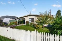 4 Baragoon St Howrah TAS 7018 $760,000 Positioned in a quiet, family-friendly street and set on a completely level block, this much-loved weatherboard home offers space, flexibility and an outstanding location. With shops, schools, parks and public transport all within easy walking distance, convenience is truly at your doorstep. A welcoming entry hall leads to a generous light-filled living and dining room, kept comfortable year-round with a heat pump, the living area also features an original fireplace that could easily be reinstated, adding warmth and character to the home. The practical kitchen includes a breakfast bar and adjoins the living and dining area, making it the heart of the home for everyday family life. Accommodation comprises four bedrooms, with three sunny bedrooms positioned at the front of the home and a fourth bedroom located at the rear, there is an exciting opportunity to create a master suite with ensuite, a walk-in robe, nursery, home office or even a parent’s retreat to suit your family’s needs adjacent to the fourth bedroom or leave as the current laundry. The family bathroom features a shower over the bath, with a separate toilet for added convenience. Step outside to discover a private, low-maintenance backyard with established gardens, offering the perfect place to entertain family and friends or simply relax with a morning coffee. A large 6m x 3m shed provides excellent storage, workshop space or room for hobbies, while the driveway allows you to park right at the front door-ideal for Tasmania’s ever-changing weather and direct access with a couple of steps inside. Comfortable to move straight into and enjoy, this home also offers exceptional scope to renovate, modernise and add value over time. Whether you’re searching for a spacious family home or a property with exciting future potential, this is an opportunity not to be missed. • Level block in a quiet, convenient location • Four-bedroom family home • Flexible floorplan with potential to create a master suite and ensuite • Spacious living and dining with mountain views • Heat pump plus original fireplace with potential to reinstate • Kitchen with breakfast bar • Internal laundry • Private backyard with established, easy-care gardens • Large 6m x 3m shed for storage or workshop • Driveway access to the front door • Walking distance to schools, shops, parks and public transport • Walking distance to beach and walking tracks • Study Nook Council Rates: $2500 PA (approximately) Water Rates: $1250 PA (approximately)