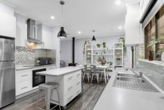 99-101 Eleventh Street Mildura VIC 3500 $649,000 - $699,000 Set on a substantial 1,301m² allotment, this impressive family residence offers an exceptional combination of space, comfort and lifestyle. Designed to accommodate growing families and those who love to entertain, this feature-packed property presents a rare opportunity to secure a home with everything already in place. Inside, the home offers four generous bedrooms, two well-appointed bathrooms and the added benefit of a dedicated study or home office, providing the perfect space for those working from home, running a business or simply needing a quiet place to study. The natural gas log fire adds warmth and character during the cooler months. Ducted evaporative air conditioning throughout ensures comfort during summer, complemented by a split system in the main bedroom for personalised climate control. The heart of the home flows effortlessly to the outdoor entertaining area, creating the perfect setting for hosting family gatherings, celebrating special occasions or simply enjoying relaxed weekends with friends. Whether you're firing up the barbecue, watching the kids play or unwinding after a long day, this outdoor space has been designed to be enjoyed year-round. Step outside and discover your own private retreat. The sparkling swimming pool and spa provide the ultimate lifestyle addition, offering endless hours of enjoyment for family and guests alike. Surrounded by established grounds and generous open space, there's plenty of room for children and pets to play while still maintaining areas dedicated to entertaining and relaxation. One of the standout features of this property is the huge shed, providing outstanding storage and workspace options for tradies, hobbyists, car enthusiasts or anyone needing extra room for equipment and toys. The convenience of dual driveways further enhances the property's functionality, allowing easy access and additional space for caravans, boats, trailers or multiple vehicles. With a versatile floorplan, dedicated study, impressive shedding and resort-style outdoor features, this is a property that truly caters to every stage of family life.
