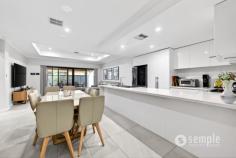 108 Mornington Cres Wandi WA 6167 LUXURY LIVING AT ITS FINEST! Gavin Pereira is delighted to present this beautifully appointed, near-new residence built in 2021, showcasing high-end finishes, effortless style, and low-maintenance living in the heart of Honeywood Estate. Thoughtfully designed for modern comfort, this exceptional home is the perfect fit for luxury downsizers, professionals, or families seeking a turnkey lifestyle in a thriving, well-connected community. Impeccably presented throughout, this home delivers soaring high ceilings throughout including the garage, and a refined blend of contemporary design and practical functionality. It has an oversized front entry and foyer which allows extra space when moving-in and will wow your family and friends on arrival. Everyone will marvel at the coffered ceilings throughout, the feature cornices, exposed aggregate concrete driveway and outdoor flooring, high-end bathrooms AND the additional attic space with ladder access. Located within the roomy double lock-up garage that also boasts an additional storage space and wall-mounted shelving. With three generous bedrooms, two elegant bathrooms plus a powder room and seamless indoor-outdoor integration, every detail has been carefully considered to elevate everyday living while offering the ideal setting for entertaining. At the heart of the home is a light-filled open-plan kitchen, living and dining space finished in a sophisticated modern palette. The tile flooring adds warmth and texture, complementing the gourmet kitchen’s stone benchtops, breakfast bar, gas cooktop and electric oven, double-sink and an absolute abundance of additional storage space. The master suite is privately positioned at the front of the home, offering a peaceful retreat complete with a huge walk-in-wardrobe and a luxurious ensuite featuring full height tiling, dual basins and stone bench vanity. Two additional bedrooms, each fitted with mirrored built-in wardrobes, are serviced by a stylish family bathroom. A Daikin ducted reverse-cycle air conditioning ensures year-round comfort, and Hik Vision CCTV and Crimsafe security doors provides all your security needs. Outdoors, the home continues to impress with a covered alfresco area featuring downlights and low maintenance design. With side access to one side, and rear garage pedestrian access this home is ideal for those seeking lock-and-leave convenience without compromise. Perfectly positioned within the sought-after Honeywood community, residents enjoy access to landscaped parks, walking trails, playgrounds, and a strong neighbourhood feel, all within proximity to schools, shops, transport, and freeway access. Features: • Luxury 2021 build • Two spacious bedrooms at the rear with large mirrored built-in-wardrobes • Luxurious master suite with walk-in wardrobe, coffered ceiling and resort style ensuite • Designer kitchen with stone benchtops, breakfast bar and premium appliances • Designer laundry room with overhead cupboards and plenty of storage options • Daikin Ducted reverse-cycle air conditioning throughout • Exposed aggregate concrete outdoor flooring • Covered alfresco entertaining area • Full home water filtration system • Low-maintenance landscaping with artificial grass and rainbow stones Location (Approximate): • 0.20KM – Honeywood Primary School • 0.35KM – Nido Early School • 1.70KM – Wandi Pavilion & Community Centre • 1.60KM – Buttercups Childcare • 2.00KM – Kwinana Freeway access • 3.20KM – Wandi Nature Reserve • 3.50KM – IGA Aubin Grove • 4.50KM – Harvest Lakes Shopping Centre • 4.80KM – Aubin Grove Train Station • 5.00KM – Cockburn Central precinct Don’t miss your chance to secure this stunning family home. Contact Gavin Pereira today on 0423 092 441 for more information or see you at the home open!