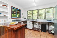 3 Verbena St Nightcliff NT 0810 $880,000 Personality and potential on large tropical block Enjoying an enviable position within one of Darwin's most sought-after suburbs, this delightful tropical property creates an exceptional opportunity for homebuyers, renovators and investors seeking potential and personality. -Character-filled home on oversized tropical block -Fantastic Nightcliff position with everything closeby -Gorgeous green aspect and louvres throughout -Tidy kitchen with gas cooking and stainless-steel counters -Airy open-plan extends to generous covered alfresco -Three well-proportioned bedrooms gathered at one side -Bathroom with clawfoot tub, separate internal laundry -Lush tropical gardens create private oasis -Tiled floors and split-system AC throughout -Garden shed, double carport, fenced and gated With Nightcliff's iconic markets only a short stroll away, this potential-packed property sits pretty in a lovely, leafy setting, from where it's mere moments to schools, conveniences, and yes, the spectacular Nightcliff foreshore. Positioned on an impressively large block, the home is nestled within gorgeously verdant gardens, creating a sense that you are escaping to your own private oasis, where you can leave the stresses of the outside world at the door. Prior to Cyclone Tracey, the property was in fact, an elevated home. Now it sits on ground level, with the original timber flooring structure in place. Packed with personality, it still charms you effortlessly, while offering opportunity to add value or make it your own with updates. In terms of layout, the kitchen integrates seamlessly with the open-plan, accentuating everyday living and entertaining. Featuring gas cooking, stainless-steel counters and a timber bench, the kitchen is tidy and functional, and could easily be left as is. Three generous bedrooms gather off to one side, while the bathroom impresses with a clawfoot bathtub. The laundry completes the layout inside, while outside, there is plenty of covered alfresco space to relax in and enjoy the lush outlook. Rounding things out, there is a garden shed, double carport and gated access up front. By car, it's around seven minutes to major shopping in Casuarina, and only 15 minutes to the city. To appreciate everything this charming property has to offer, you absolutely need to see it in person. Call today to arrange your inspection and find out what you could make of this enchanting tropical retreat. The Finer Points: Area Under Title: 1060 square metres Council Rates: Approx. $3,210 per annum Easements: None Found Zoning: LR (Low Density Residential) Images have been digitally enhanced for marketing purposes and should be used as a guide only.