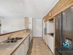 12 Bindoo Rise Woodvale WA 6026 Open for inspection Sun 02 Aug 11:30 AM - 12:00 PM Set on a spacious 750 sqm landholding and designed with growing families in mind, this 5 bedroom, 3 bathroom family home has 4 separate living areas, outdoor entertainment area, bar and swimming pool. Built by the current owner in 1988 and standing the test of time, this lovely home has a large kitchen with gas stovetop, electric oven and an abundance of bench space and storage. The kitchen also includes a walk in pantry, dishwasher and generous fridge space. With private, self contained accommodation at the rear of the house, this home offers the ability to have multigenerational living or separate guest accommodation with a bedroom, bathroom and lounge all under the main roof of the house. Some other notable features of this wonderful home include: - Impressive 268 sqm internal living space. - Generous master bedroom with walk in robes and ensuite. Includes a lovely outlook of the front gardens. - 3 additional bedrooms all with built in robes. - Private accommodation area with bedroom, ensuite and living room. Ideal for guests. - 4 separate living areas (sunken lounge, formal dining with a lovely outlook, living room and games room). This amount of space ensures even the largest families have enough room. - Large undercover outdoor area with plenty of space for summer dining, BBQs and has picturesque northerly views. - Spacious laundry, the size of which is unseen in many modern day homes. - Salt water swimming pool. - Garden shed. Local amenities include: - An abundance of parks including a short walk to Cornish Park, Gascoyne Park Playground, Chichester Park & Timberlane Park. - Woodvale Secondary College, Woodvale Primary School and North Woodvale Primary School all within a stone's throw. - Woodvale Tavern. - Woodvale Shopping Precinct with Woolworths, fast food, restaurants and more. - Easy access to freeway and public transport. This is a very well built, much loved family home and it can be yours today but you'd better be quick! Features Air Conditioning Fully Fenced Outdoor Entertainment Area Swimming Pool - In Ground Broadband Internet Available Built-in Wardrobes Dishwasher Floorboards