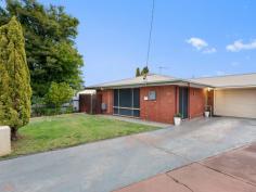 5A Eccles Pl Hannans WA 6430 Offers From $495,000 Perfectly suited to first home buyers, young families, downsizers, or savvy investors, this well-maintained brick home (circa 1990) offers comfortable living in a quiet cul-de-sac with no Strata fees. Property Features: · 3 bedrooms, all with built-in robes · 1 bathroom with shower, bath and vanity · Separate toilet located off the laundry · Open-plan kitchen and dining area · Separate lounge room positioned at the front of the home · Pull-out pantry cupboard and a dishwasher in the kitchen · Evaporative air-conditioning plus gas heating · Reverse-cycle split system to the main bedroom · Natural gas connected for hot water service and gas heating · Electric cooking appliances · Internal linen cupboard plus an additional storage cupboard · Remote-controlled single lock-up garage (enough space for a 4x4) · Extra storage shelving at the rear of the garage · Enclosed backyard with established gardens · Automatic reticulation for easy garden maintenance Location Highlights: · Quiet cul-de-sac setting · Close to shops, schools, medical services and local amenities · Minutes from the golf course Offering a practical floorplan, low-maintenance lifestyle and sought-after Hannans location, this property presents an excellent opportunity to enter the market, downsize with ease or expand your investment portfolio. Call Lorna Flanagan on 0406 567 148 to arrange a viewing. Council rates: $2,672.02 pa Water rates: $296.90 pa (approx.)