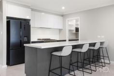 31 Glenmore Drive Tamworth NSW 2340 $1,200,000 - $1,250,000 This well-designed family home is the epitome of luxury living and the perfect place to call home. Set up for entertaining with sensational indoor and outdoor living areas and a sleek modern kitchen at the heart of the home boasting a butler's pantry and huge island bench. Expansive open plan living and dining, an additional media room, plus an office and ample storage space throughout. Offering four bedrooms, each complete with built in wardrobes with the master suite encompassing class and elegance with a walk-in robe and spacious and sophisticated ensuite. The sparkling swimming pool is a true staple of this home, with incredible views creating a relaxing space to unwind. Other features include ducted reverse cycle air-conditioning throughout and a double lock up garage. Located in the popular estate of Moore Creek Gardens on approximately 2,033sqm of land, this incredible package is not to be missed. Crafted for the modern family, every inch of this home has been thoughtfully curated. From its sophisticated layout to its stylish features, this residence is an oasis where families can live, entertain, and unwind in pure comfort.