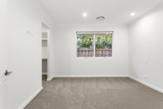 100A West Rd Bassendean WA 6054 $1,499,000 A rare opportunity to secure a new three bedroom, two bathroom home finished to a standard well above the ordinary, set in one of Bassendean's most convenient pockets. From the moment you step inside, the quality is obvious. A soft grey palette runs throughout, paired with sheers, carpet and blinds that give every room a calm, considered feel. The master bedroom is generously sized and features a walk in robe and ensuite. Bedrooms two and three both feature built in robes and are serviced by a main bathroom with a bath, vanity and separate shower. Both bathrooms are finished floor to ceiling in tile, and a powder room off the main living space adds everyday convenience for guests. At the heart of the home, the open plan family and dining area stretches as far as the eye can see, flowing through stacker doors to an alfresco fitted with its own fan, ready for entertaining in any season. The kitchen matches the ambition of the space, with waterfall edge stone benchtops, a semi integrated dishwasher, Bosch appliances, a gas cooktop, a plumbed fridge recess and a pantry. For a quieter night in, the theatre room offers its own dedicated retreat, complete with striking vaulted and coffered ceiling detail that gives the space real character. It is a perfect spot to settle in for movie nights, away from the buzz of the main living area. Practical comfort has not been overlooked. Ducted reverse cycle air conditioning, a remote operated alarm, a Rheem hot water system and a water tank all come standard, while 3.5kw solar with provision for an electric car keeps this home ahead of the curve. A double garage with excellent height clearance and a separate store offer real day to day flexibility, and higher, wider door frames throughout provide easy wheelchair access. Outside, concrete aggregate paving and fence lines taller than standard add privacy and street presence in equal measure. Location adds another layer of appeal here. Positioned within Bassendean's tightly held pocket, this home puts you moments from West Road's local favourites, including Last Crumb Cake Co for your morning coffee and something sweet. Add in easy access to shops, schools and transport, and everyday life becomes that much simpler. Homes of this calibre in this location do not come around often. Contact us today on 0428 001 187 to arrange your inspection.