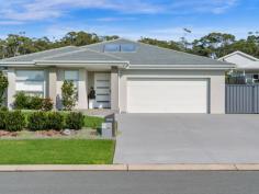 34 Como Ave Burrill Lake NSW 2539 $1,280,000 Spacious Coastal Family Retreat Beautifully presented and generously proportioned throughout, this impressive five-bedroom, three-bathroom family home offers multiple living spaces, modern comfort and relaxed coastal living, all positioned close to bush reserve, Burrill Lake inlet and just an easy 1km walk to Dolphin Point Beach. Designed with flexibility in mind, the well-planned split-level floorplan creates fantastic separation for the whole family, with the master suite privately positioned away from the additional bedrooms and living spaces. Perfectly suited to growing families, extended family living or those simply wanting space to spread out, both the master and guest suites feature walk-in robes and stylish ensuites. A separate media room, expansive open plan kitchen, dining and living area, plus an additional rumpus/activity room provide fantastic versatility for everyday living and entertaining. Step inside to light-filled interiors where tiled flooring and crisp contemporary finishes flow seamlessly throughout the home. Without a doubt, the heart of the home is the stunning gourmet kitchen featuring a huge Caesarstone island bench, stainless steel appliances, stone benchtops, subway tiling, plumbed double-door fridge space and a generous walk-in pantry with exceptional storage. The spacious open plan living and dining area flows effortlessly to both covered alfresco entertaining areas overlooking beautifully maintained gardens and manicured lawns — perfect for entertaining family and friends year-round. Outside, the fully fenced backyard offers plenty of space for children, pets and gardening enthusiasts, complete with established gardens, garden shed, double garage and dedicated boat or caravan storage area. Enjoy the very best of the South Coast lifestyle with bushwalking trails, wetlands, cycleways, kayaking, paddleboarding and fishing all close by. Local cafés, Lagom Bakery, fresh seafood, BBQ areas, reserves and the local IGA supermarket are all within easy reach, along with beautiful nearby beaches and coves. Features: * Five bedrooms and three bathrooms * Ensuite and walk-in robes to master and guest bedrooms * Double garage with ample storage throughout * Multiple living zones including media and activity rooms * Ducted reverse cycle air conditioning * Split-level design offering great family separation * Alfresco entertaining areas * 9.9kW solar system plus solar hot water * Boat or caravan storage area * Fully fenced backyard with established gardens * Garden shed * Easy 1km walk to Dolphin Point Beach * Close to Burrill Lake inlet, wetlands, shops, cafés and walking tracks * Nearby cycleways, reserves, BBQ areas and beaches Features All Weather Outdoor Entertaining Area Boat or Caravan Storage Built In Robes Ceiling Fans Dishwasher Ducted Cooling Ducted Heating Ensuite Established Gardens Established Neighbourhood Firepit Area Fully Fenced Guest Accommodation Low Maintenance Open Plan Living Outdoor Entertaining Shed Solar Hot Water Service Solar Panels Town Water Walk to Beach Walk to Lake