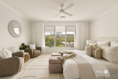 119 Tooloom Cct Upper Kedron QLD 4055 Top Offer Closing - 24 August at 3pm Contemporary Queensland Living with Spectacular Views Positioned on an elevated 858m² allotment, this exceptional modern Queenslander captures breathtaking panoramas from sunrise to sunset. Built by Brighton Homes less than two years ago, this beautifully crafted residence combines timeless architectural charm with contemporary luxury, offering an enviable lifestyle in one of Upper Kedron's most tightly held pockets. Perfectly positioned to embrace its commanding elevation, the home enjoys picturesque easterly views together with breathtaking western sunsets across the D'Aguilar National Park and surrounding mountain ranges. Offering approximately 360m² under roof, the intelligently designed floorplan provides outstanding flexibility for growing families, including five generous bedrooms, three luxurious bathrooms, and three separate living areas. A sought-after feature is the dedicated guest bedroom and full bathroom on the ground floor, providing the ideal space for extended family, visitors or those seeking multi-generational living. The expansive backyard has been beautifully landscaped with native Australian gardens, creating an idyllic setting with plenty of room for children and pets to play, evenings around the fire pit, and the opportunity to add a spectacular infinity pool overlooking the ranges. Inside, premium finishes are evident throughout, with hybrid timber flooring, designer stone surfaces and an impressive selection of high-end inclusions that elevate everyday living. Features You'll Love • Elevated 858m² allotment with spectacular panoramic outlooks • Approx. 360m² of living under roof • Built by Brighton Homes less than two years ago • Five spacious bedrooms • Three designer bathrooms • Dedicated guest bedroom and full bathroom on the ground floor • Three separate living areas offering exceptional family flexibility • Double remote garage • Stunning easterly views and magnificent western sunsets across D'Aguilar National Park and the mountain ranges • Premium hybrid timber flooring throughout • Designer kitchen featuring low-silica Caesarstone benchtops to the kitchen, butler's pantry and bathrooms • Butler's pantry • 900mm Fisher & Paykel induction cooktop and electric oven • Built-in Fisher & Paykel microwave • Plumbing provision (tap) for refrigerator • 22kW reverse-cycle ducted air conditioning with eight independently controlled zones • 6.6kW solar power system • Electric vehicle charging station • Steel frame construction with a 50-year structural warranty • N3 wind rating • Retractable fly screens to the alfresco corner stacking doors for seamless indoor-outdoor living • Electric hot water system • Beautifully landscaped gardens featuring native Australian plants • Fire pit area for year-round entertaining • Expansive backyard with room for children, pets and a future infinity pool (STCA) • Elevated position capturing cooling breezes, outstanding privacy and unforgettable sunsets Why You'll Love Upper Kedron • Surrounded by beautiful bushland and the walking trails of D'Aguilar National Park • Family-friendly community with quality schools nearby, including St Andrew's Catholic School and Ferny Grove State High School • Close to local cafés, shopping and everyday conveniences • Approximately 15km from Brisbane CBD • Easy access to public transport and major arterial roads A Lifestyle Above the Rest Rarely does a near-new home combine premium construction, exceptional family functionality and one of Upper Kedron's most breathtaking outlooks. Designed to embrace Queensland living while delivering outstanding comfort, energy efficiency and luxury, this remarkable residence presents an exceptional opportunity to secure one of the suburb's finest contemporary homes.