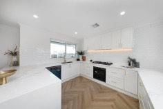 16 Buckland Cres Keilor VIC 3036 $1,050,000 - $1,150,000 Two fully- renovated homes in one Situated in a family-focused Keilor neighbourhood, this single-level home is sure to make an indelible impression with its first-class renovations, flawless presentation and fully self-contained section for ultimate versatility. Filled with natural light, the home’s totally-transformed interior comprises four bedrooms (large main) all with built in robes, as well as a deluxe fully-tiled ensuite and equally-stylish central bathroom. Adding to the appeal is a spacious living room with electric fireplace flowing through to the open dining area accompanied by a superb new kitchen complete with ample cupboard space, wine fridge and Westinghouse appliances. Other stand-out features include dual-zone ducted heating/refrigerated cooling, herringbone 9mm hybrid flooring, premium insulation and double-glazed windows all-round, along with a full-size modern laundry and stylish stone surfaces throughout. Complementing the home’s impressive accommodation is a self-contained one-bedroom unit (converted garage) including its own modern bathroom with laundry facilities, living/meals area and adjoining kitchen. Rounding things out is an undercover alfresco entertaining area and private low-maintenance yard to enjoy, plus two-car gated off-street parking via Patterson Avenue and single-car gated off-street parking via Buckland Crescent. Bus stop around the corner along with local parks and Taylors Creek trails, it’s also close to village cafes, specialty shops and a range of schools (Overnewton College, St Augustine’s PS and Keilor PS), as well as easy access to the Calder Freeway.